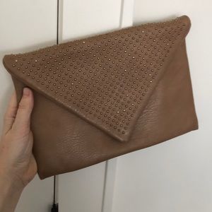 Gold detailed leather clutch